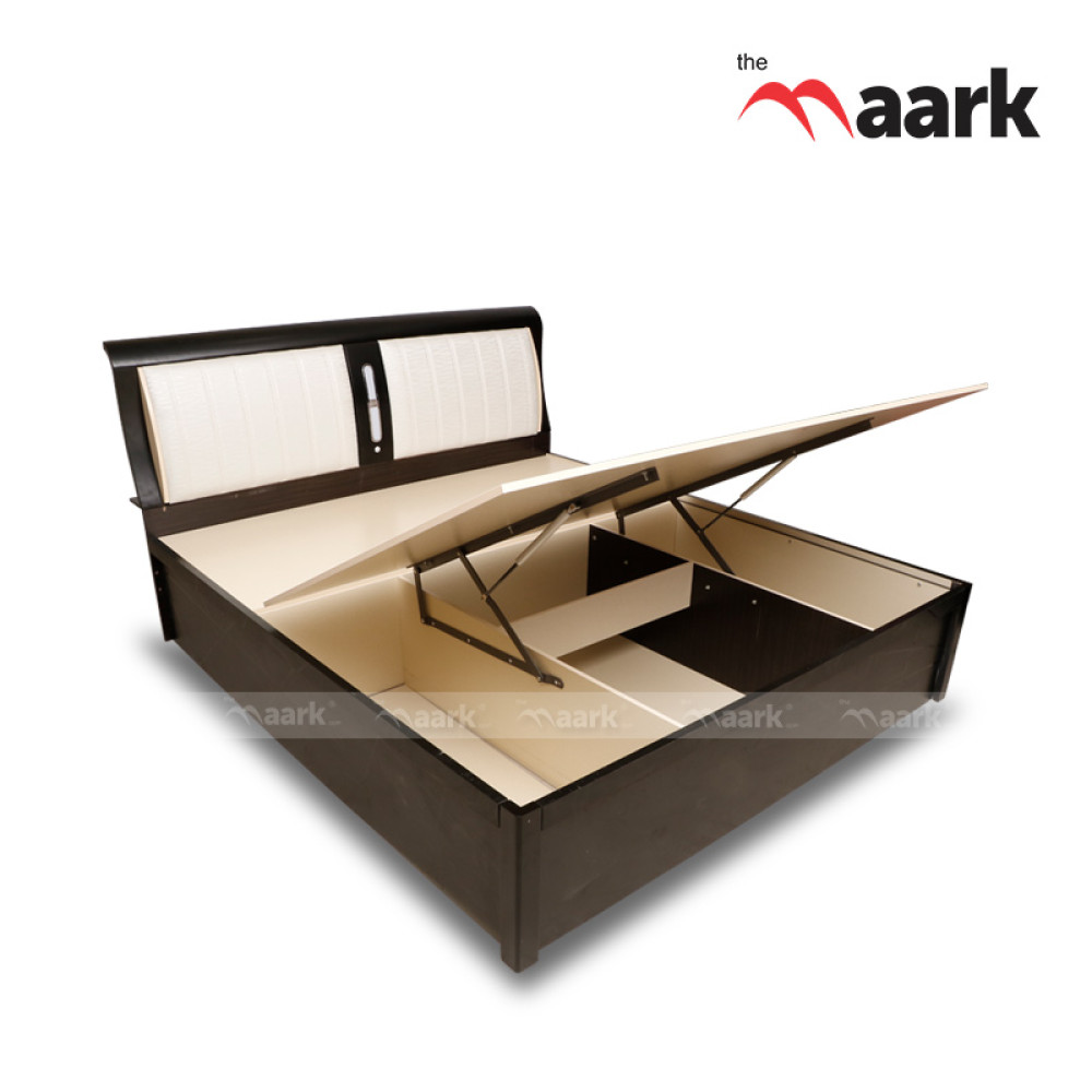 Cot with store hydraulic storage
